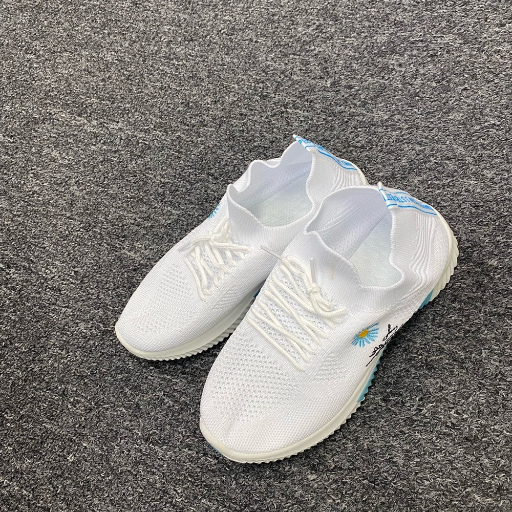 White Sneakers with Blue Accents